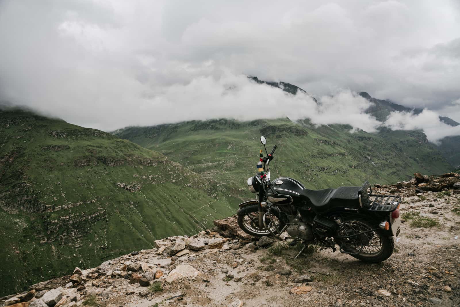 Adventure motorcycle helmet on a bike in the mountains