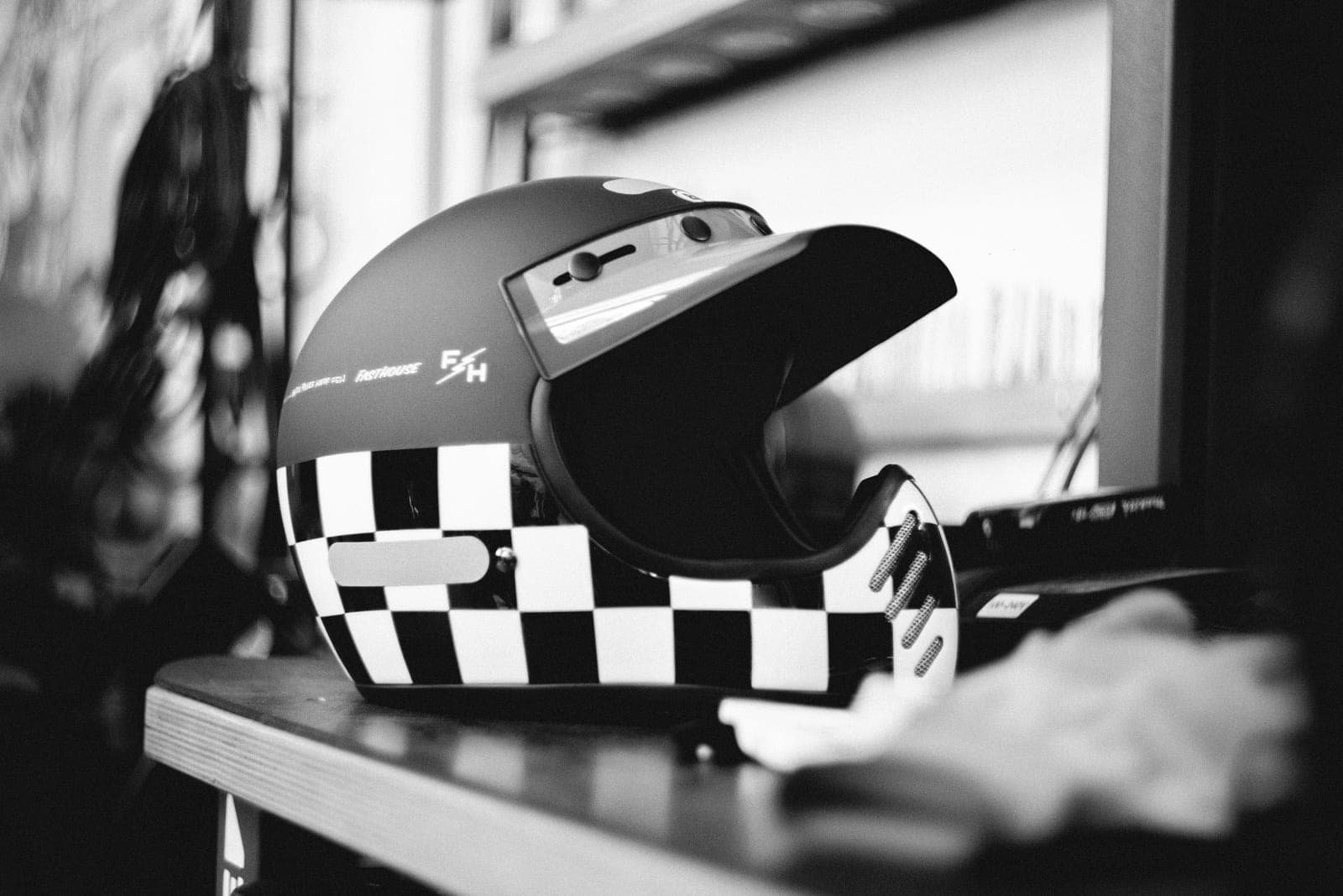 Motorcycle helmets on a retailer shelf