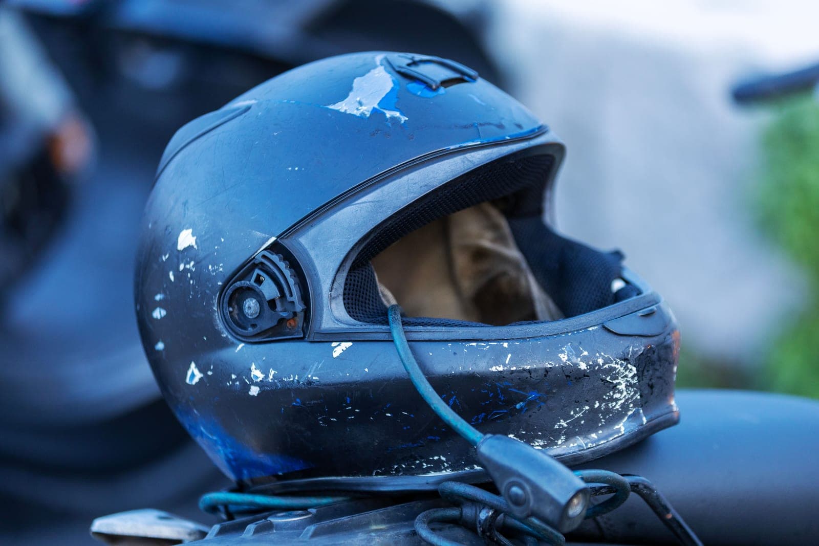 Motorcycle helmet visor being inspected