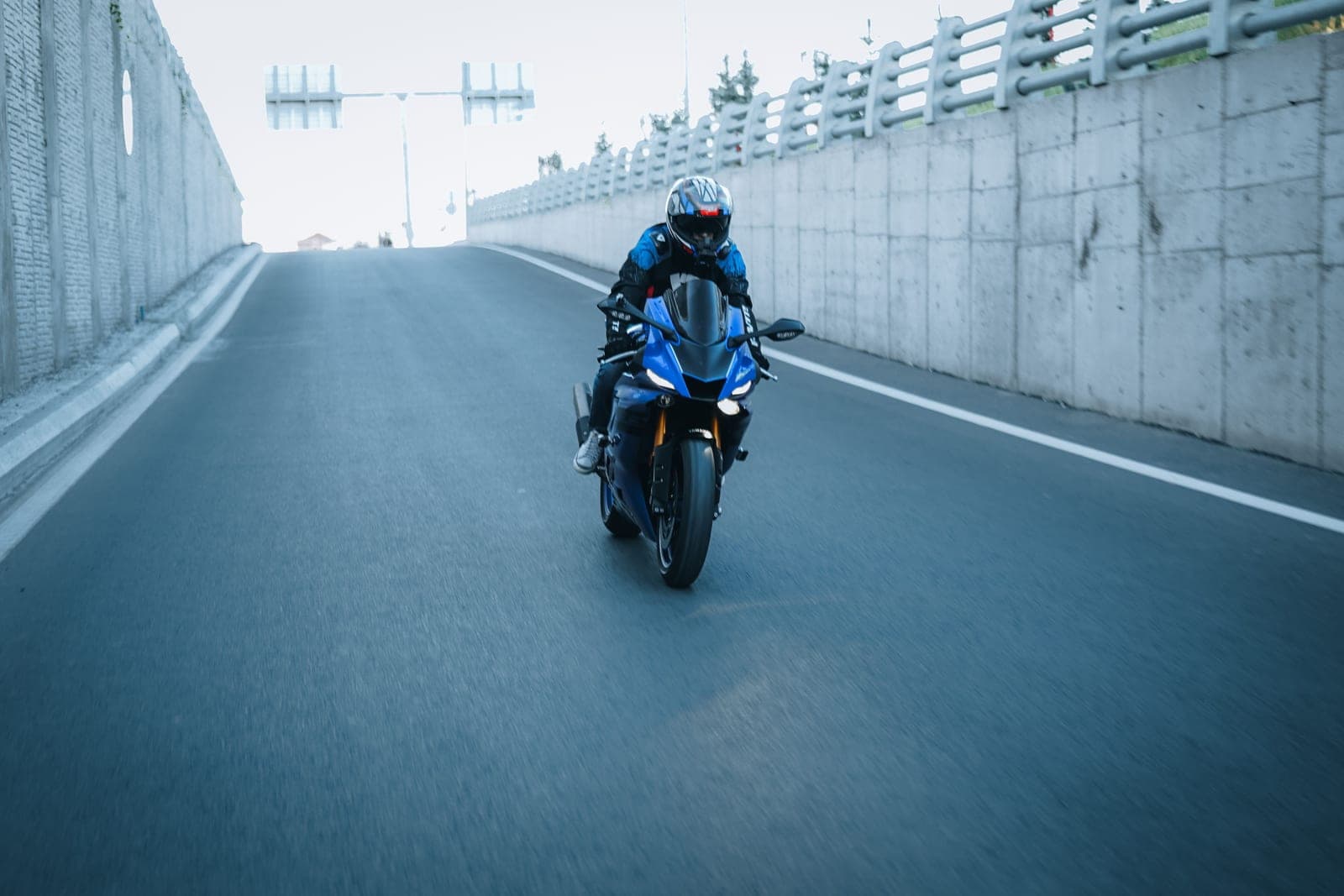 Rider in a full-face helmet with a clear visor