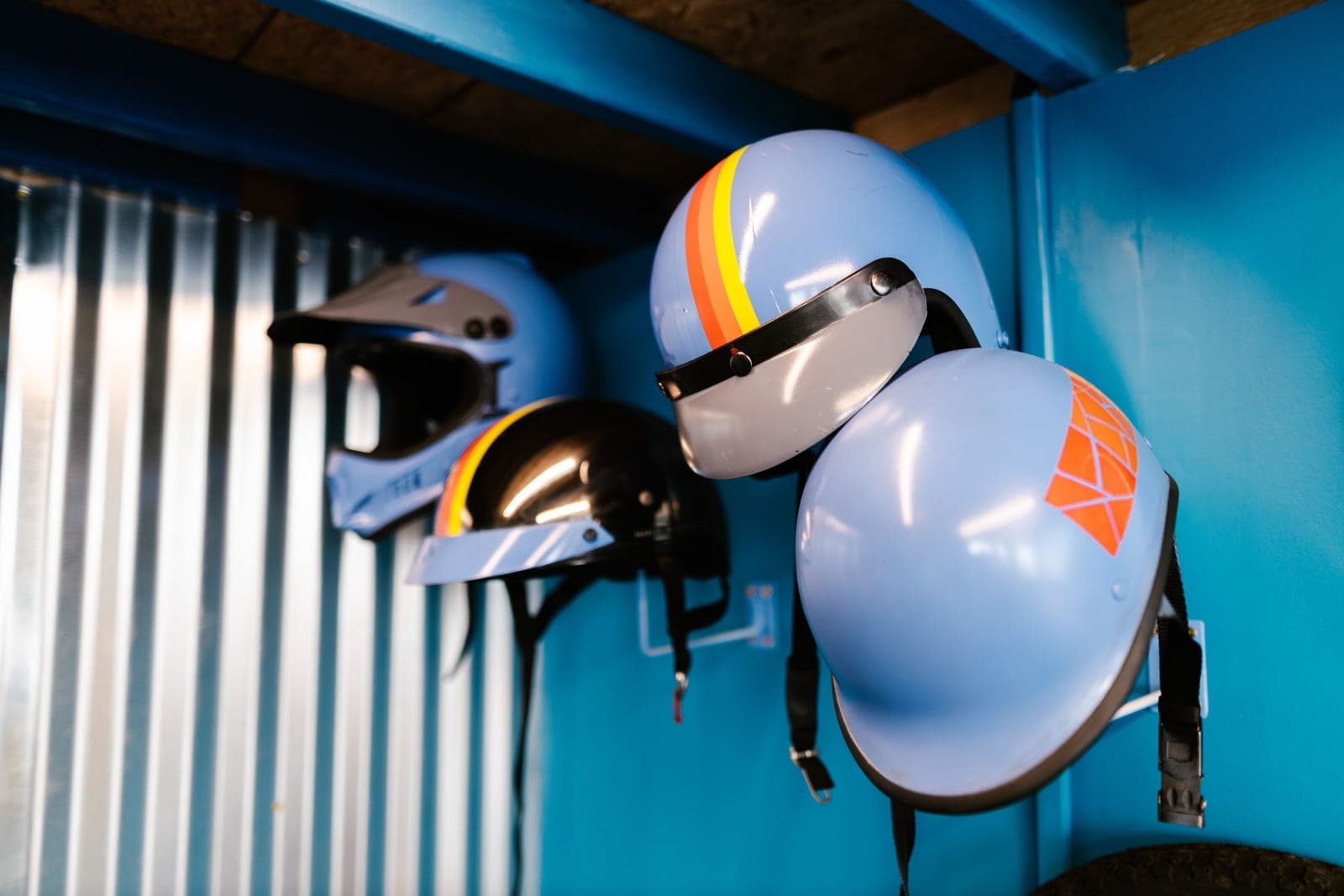 Motorcycle helmets with visors, showing shield detail